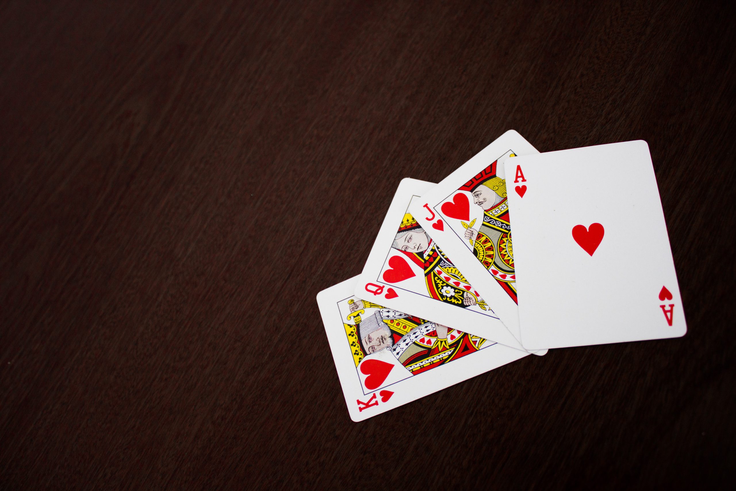In poker, what exactly is a flush draw?